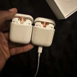 2nd generation Airpods W/ Charging case