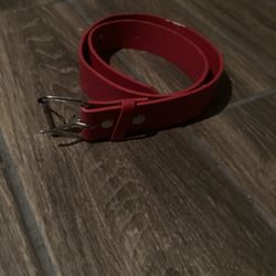 Red belt with silver buckle