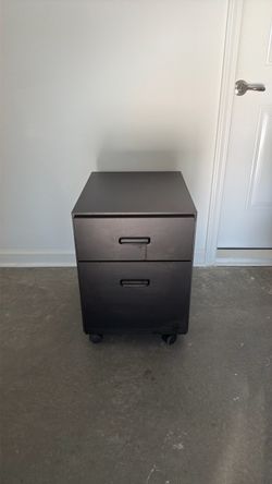 Just $25 File cabinet on wheels and like new condition.