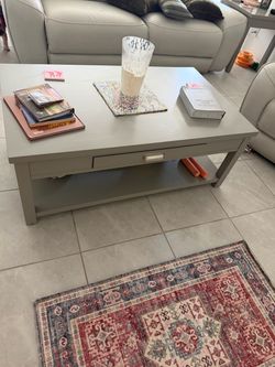 Cocktail table and two end tables