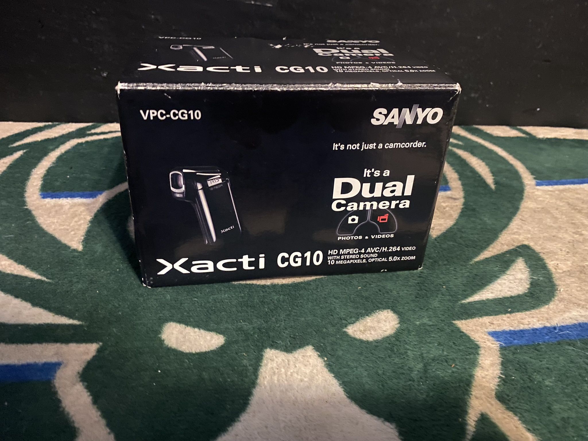 Sanyo Xacti CG10 Dual Camera HD Flash Memory Camcorder with 5x Optical Zoom.