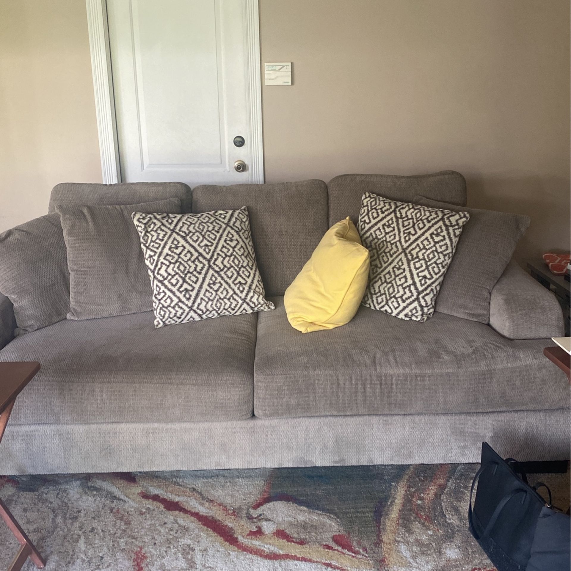 Two Piece Couch Set With All Pillows Included. Good Condition Gray. $100 OBO