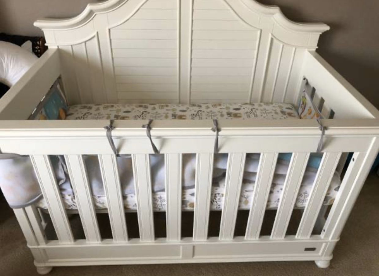 Brand New Baby Crib by Bassett made out of Wood. Original price $600.00 plus tax Crib can be converted into a full bed when the time comes. Very