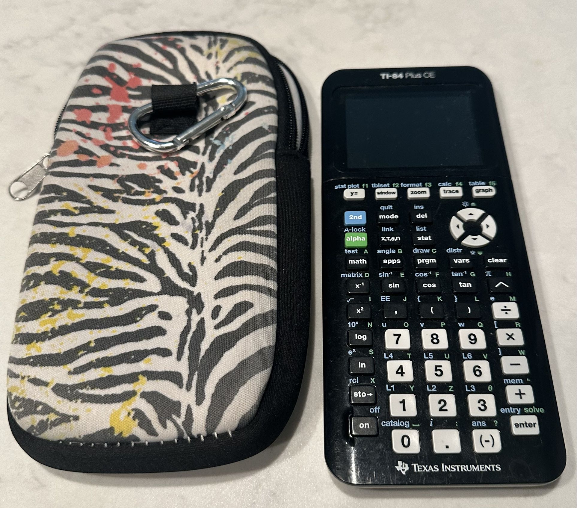 Texas Instruments TI-84 Plus CE Graphing Calculator + Case & Battery