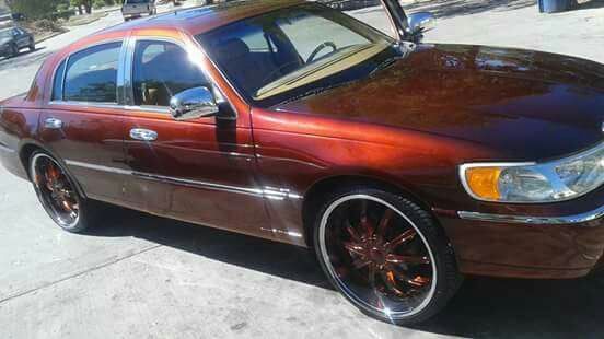 98 candy painted root beer brown Lincoln Town Car