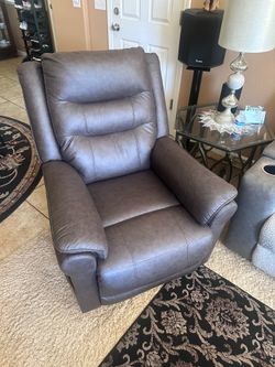 Ashley’s massager/ recliner single couch