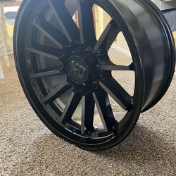 (1) 20x10 KMC XD855 Gloss Black And Machine Rim: 6x139.7/6x5.5, -18mm Offset