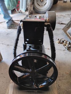 Compressor pump and flywheel