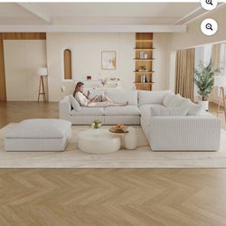 Brand New-Courderoy Xtra Long Couch With Two Hugs Ottomans Creating A Sectional Type Setting
