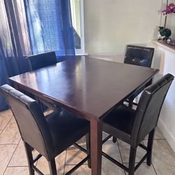 4 Chairs And High Tables