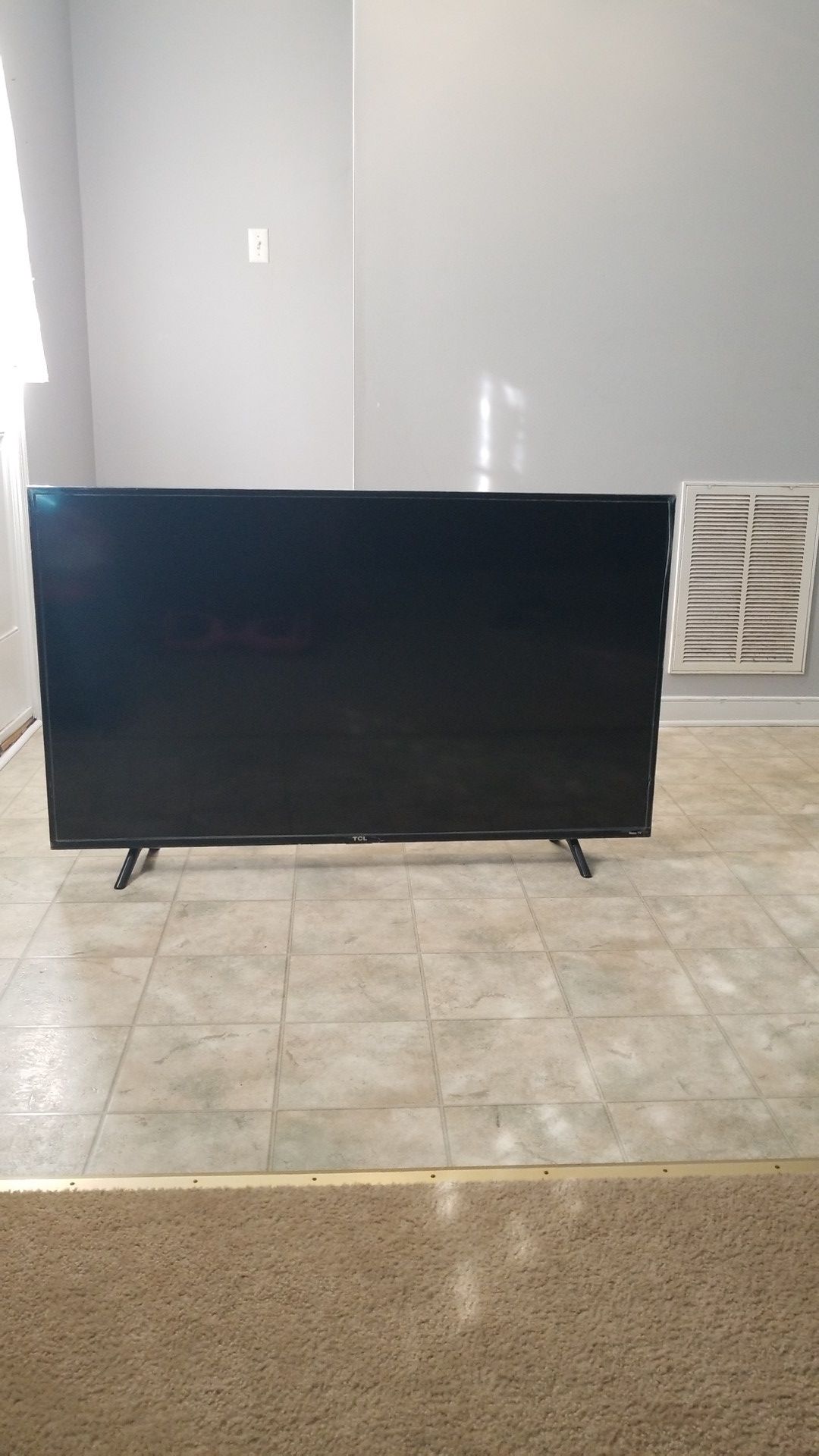 TLC Roku flat screen tv(in wrapping still) 55 inch