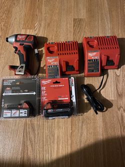 Milwaukee One impact drill, two chargers, and two batteries. They are new. $270 For All