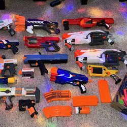 Lot of 13 Nerf guns w/ Ammo and attachments