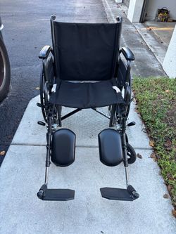 Black Folding Wheelchair with Leg Rests