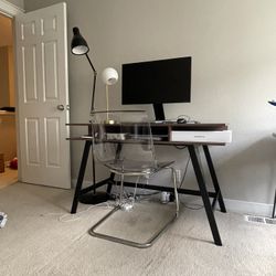 Midcentury Modern Desk With Black Floor Lamp And Chair