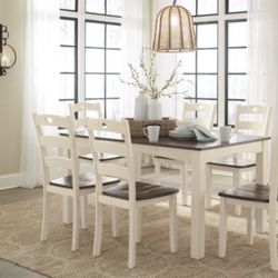 Dining table and six chairs