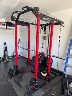 MIKOLO Weightlifting Rack with Barbell, Weights and Bench