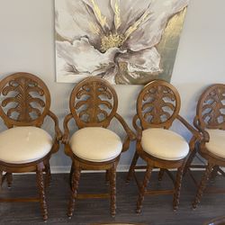 4 Handcrafted swivel barstools