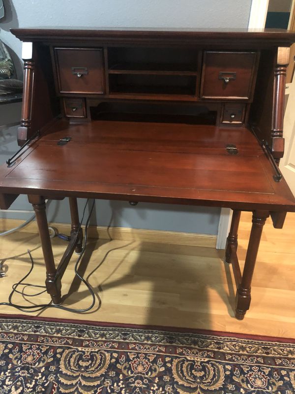 Carved wood roll top desk. ( 3 feet long x 44 inches ...