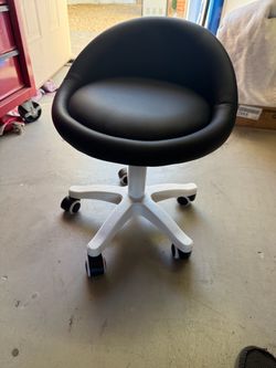 Brand new rolling garage or office chair