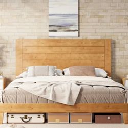 King size bed frame. New in box. Solid wood 