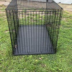 dog cage 30” wide 48” long lying down, 33” long