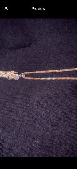 San Judas pendant, and a Franco 20inc 14kt