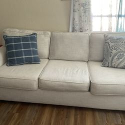 “Gently Used 2-Piece Living Room Set – Clean & Sturdy”
