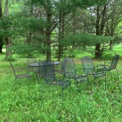 Repost Two patio sets each with four chairs $150 per set the glider is sold