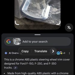 chrome ABS plastic steering wheel trim cover designed for Ford F-150, F-250, and F-350 trucks.  Made from high-quality ABS plastic with a chrome finis