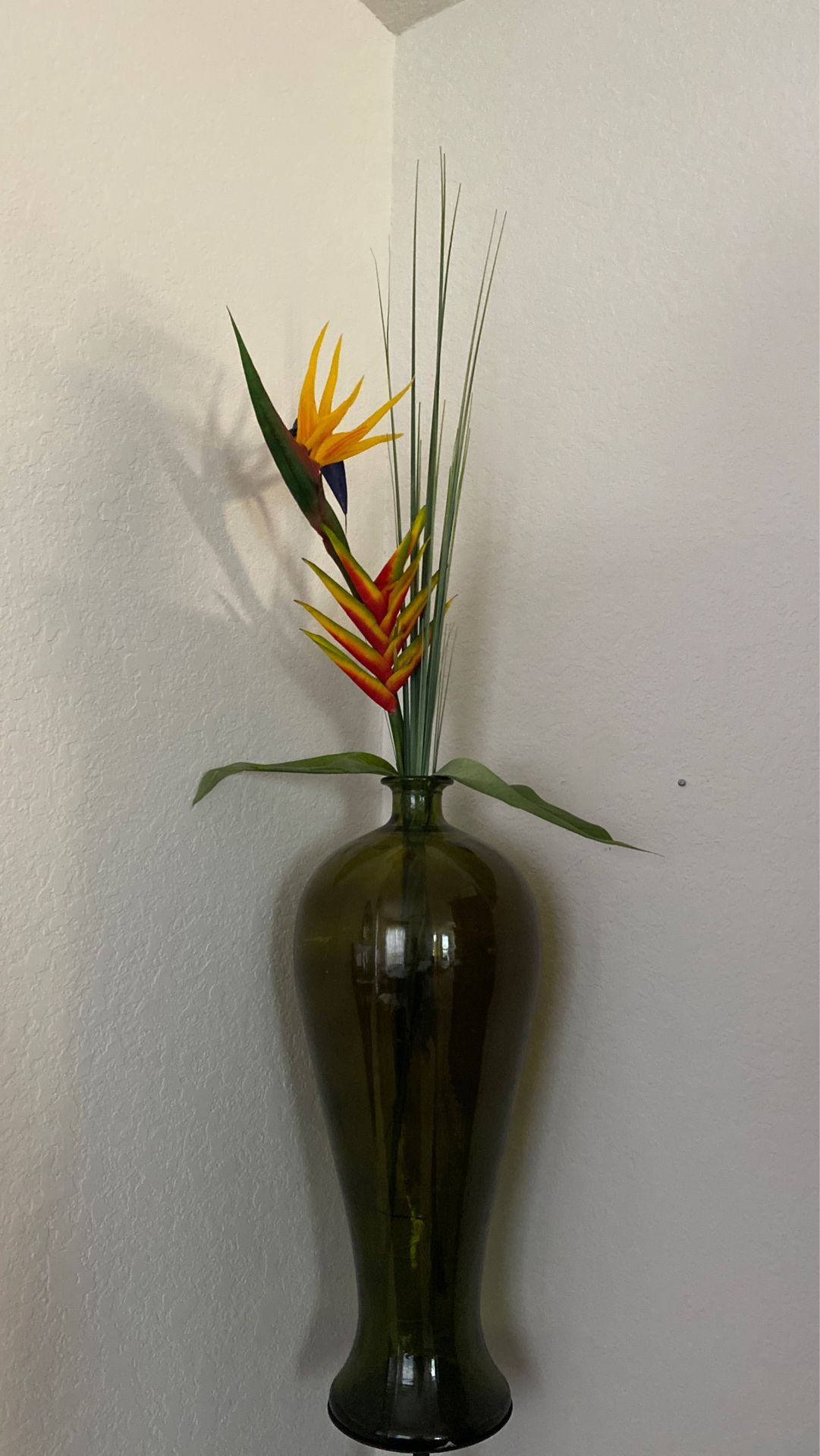 Glass vase with bird of paradise flower