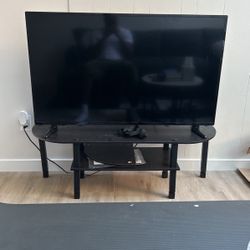 50 Inch TV And TV Stand; Remote Works Sparingly