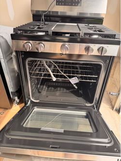 Brand new Gas oven, dishwasher and microwave