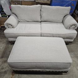 Beautiful sofa with oversized cushions and Ottoman . Excellent used condition. Includes sofa cover.

Sofa 80x43x43"
Ottoman 44x30x33"

$400 FIRM