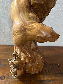 Solid piece hand carved otter swimming through underwater vegetation in Great Condition