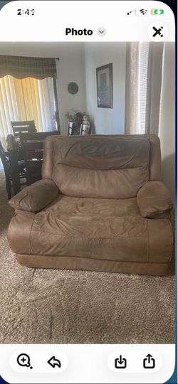 Used over sized recliner with auto push button $100 obo cal (contact info removed)