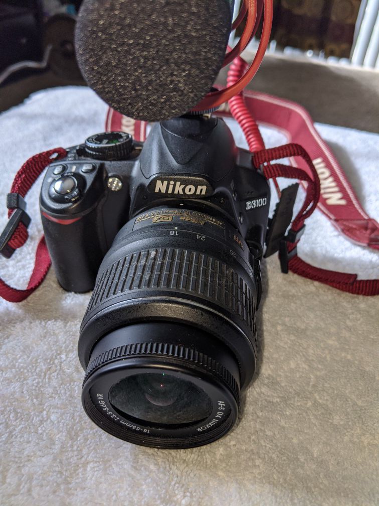 Nikon D3100 with DX 18-55mm lens and RODE mike