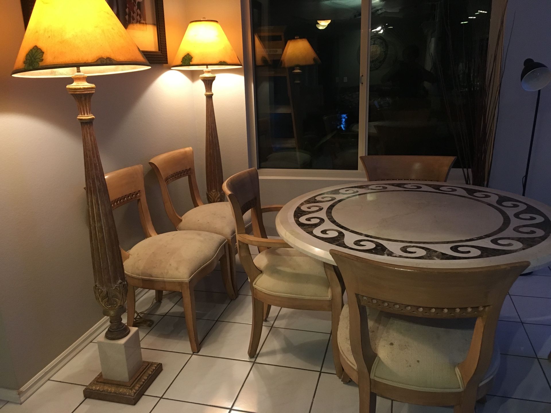 Kreiss furniture set. Travertine table, 6 chairs, and matching lamps
