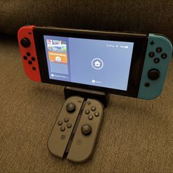 Nintendo Switch + Extra Controller 