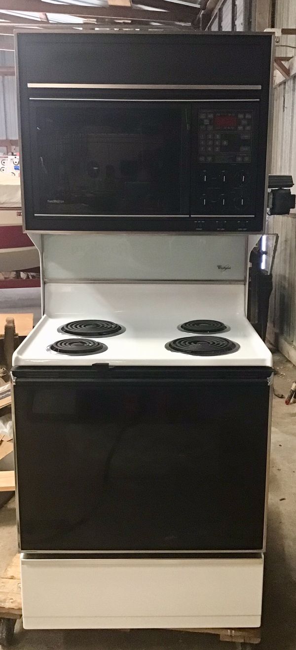 Whirlpool electric stove with attached microwave rarely used in great condition for Sale in