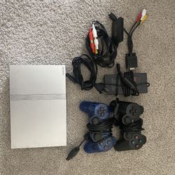 PlayStation 2  Slim / Silver - With Games, Controllers, & Memory Card