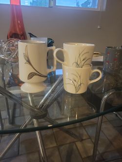 Vintage coffee mugs.  Two Corelle, one Buffalo china.
