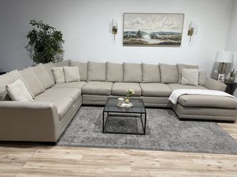 Large beige sectional couch - Delivery available