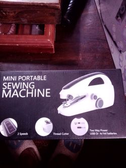 Mini portable sewing machine