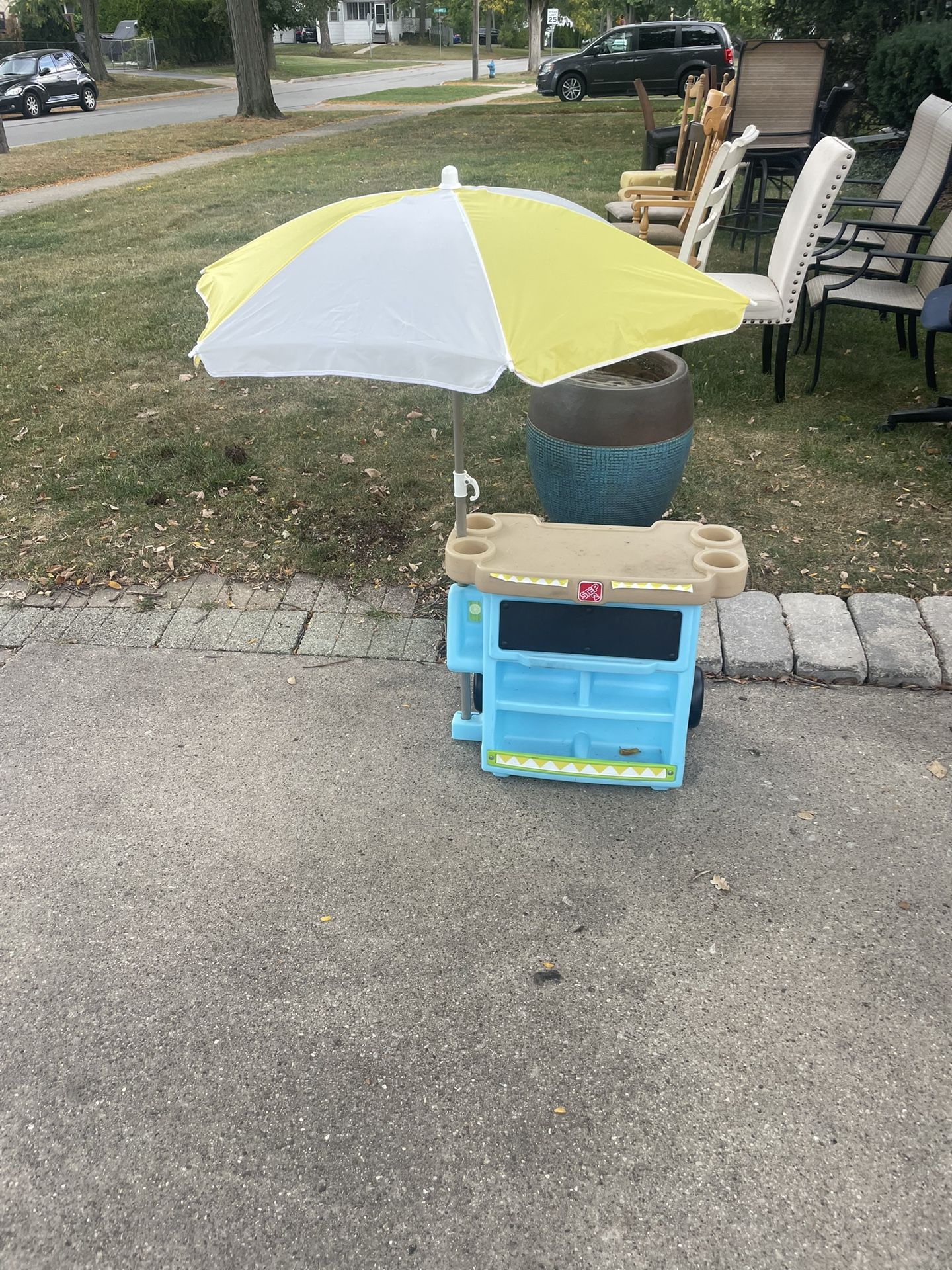 Step 2 , Kids Play Set with Umbrella and push wheels, $10