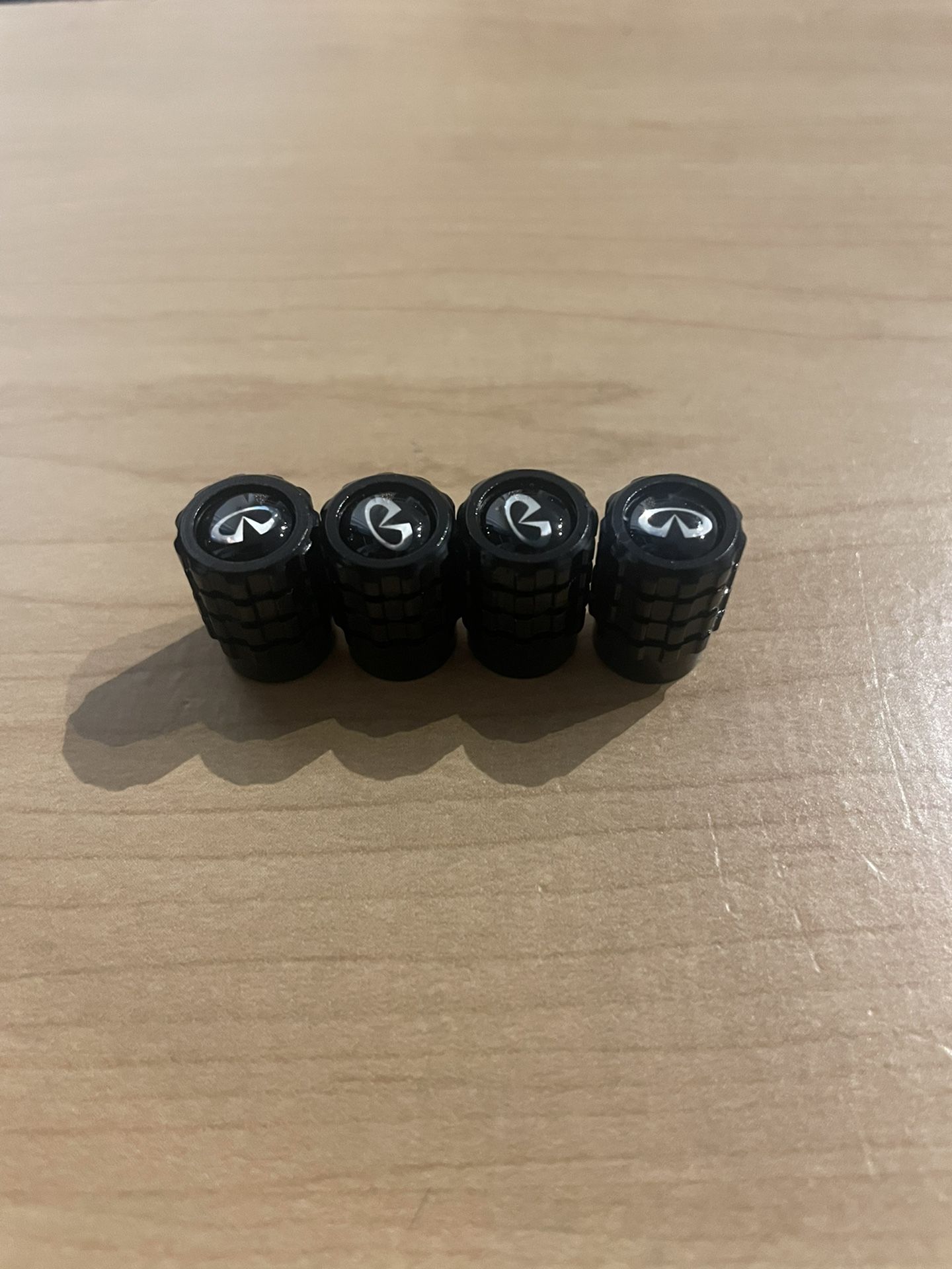 INFINITI TIRE VALVE STEM CAPS BLACK