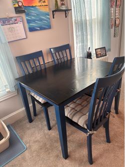 Farmhouse dining room table, and set a four chairs