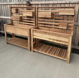 raised planter box with shelf and small planter box wall