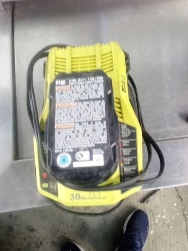 Ryobi Fast Charger And 18 V Lithium Battery