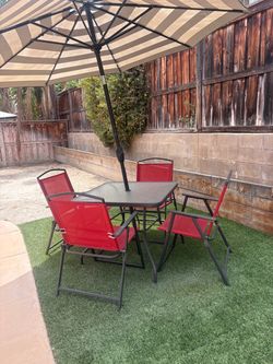 4 red chairs & table